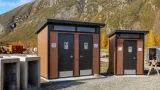 New accessible metal-framed outhouses replace crumbling concrete at Stewart Crossing rest stop