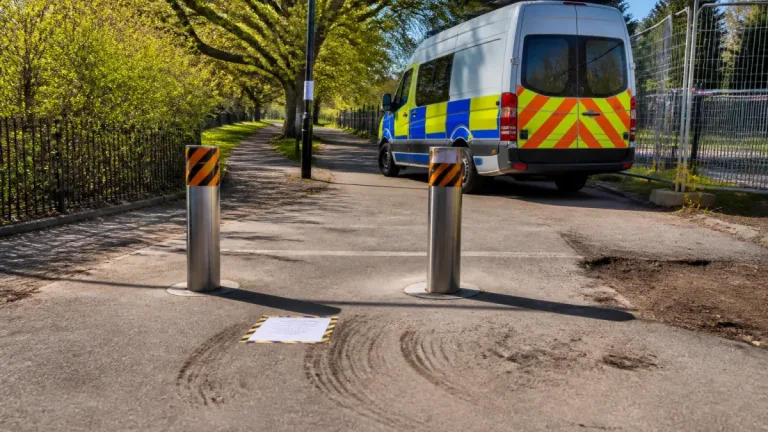 Retractable bollards added after encampment in Kingston park abroad